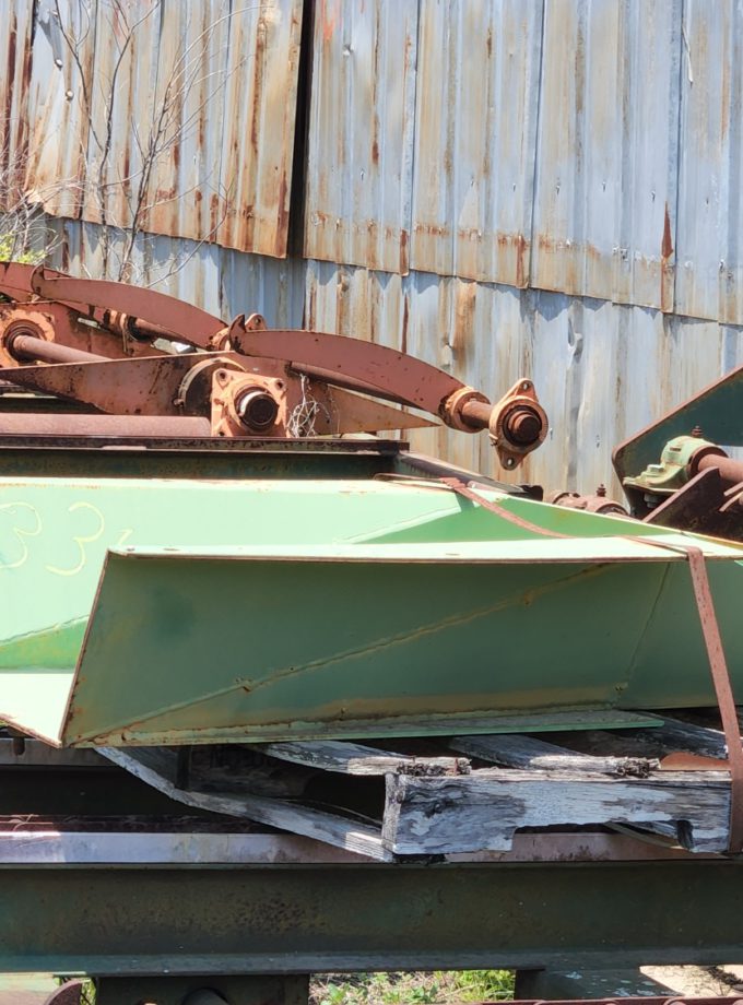 Precision Vibrating Conveyor Transition for Chipper